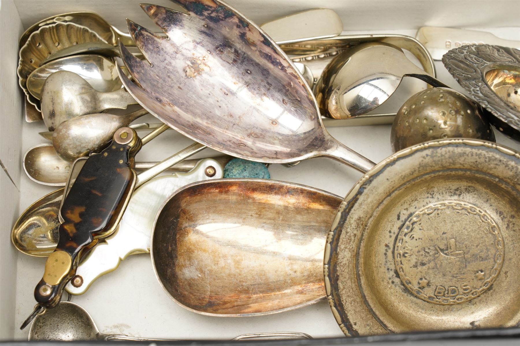 Pair of folding lorgnettes in tortoiseshell case, another in mother of pearl case, 800 standard silver saucer dish 'Stella Polaris', salt inset with a George II coin, plated cutlery etc