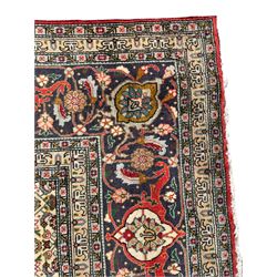 Perisian Bidjar crimson ground rug, within scalloped borders, central pole medallion, the field decorated all over with floral Herati motifs, guarded border decorated with repeating stylised plant motifs and trailing branch 