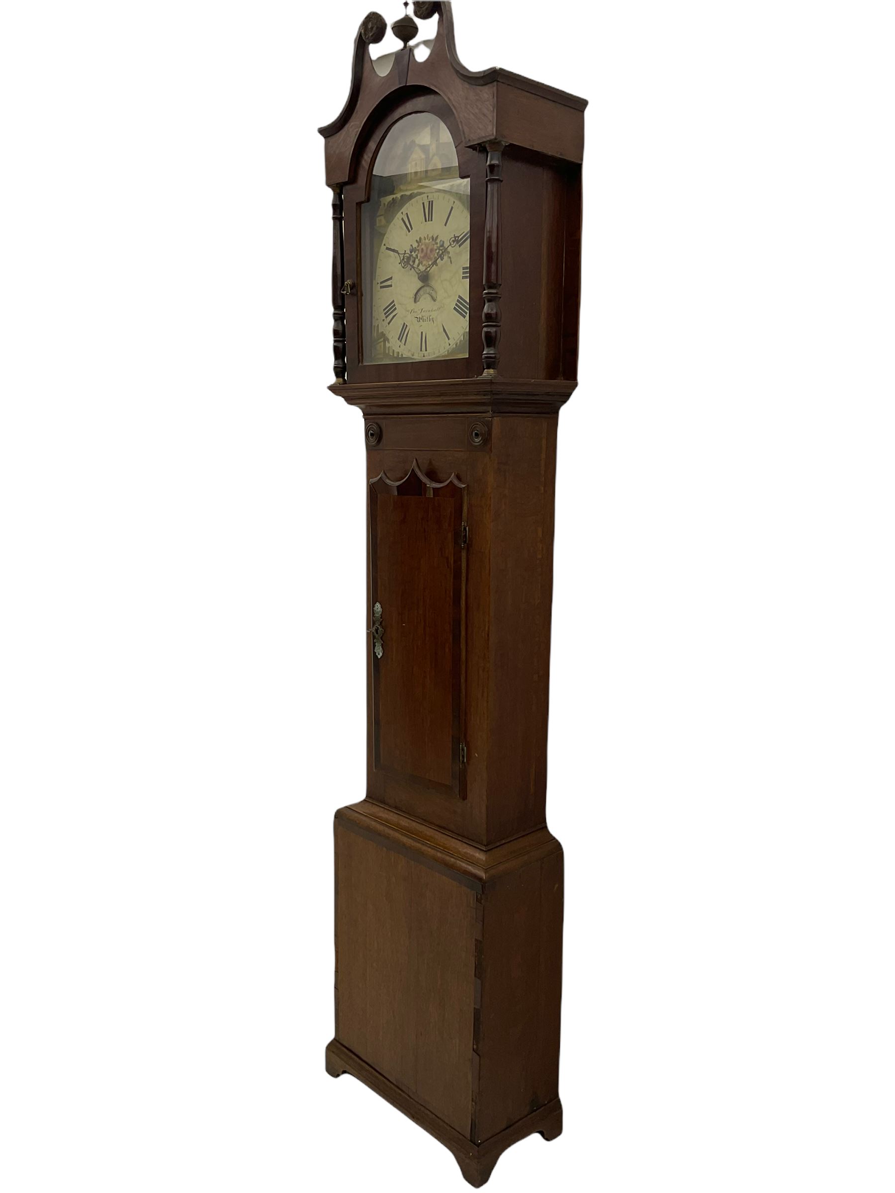 A 19th century Oak and Mahogany 30hr longcase clock retailed by “Turnbull of Whitby” with a tall swans neck pediment, brass ball and spire finial and two stamped brass paterae, glazed break-arch door flanked by two turned pillars, full-length wavy -topped trunk door on a rectangular base with applied shaped skirting, chain driven outside countwheel movement striking the hours on a cast bell, with a painted dial pinned directly to the movement, the arch depicting a country church, with a conforming ruin, country house and cottages to the spandrels, dial drawn with Roman numerals and minute markers with matching stamped brass hands, semi-circular date aperture and date ring behind. With weight and pendulum. 
The Turnbull family of Whitby clockmakers are recorded as working from Bridge Street, Whitby,  from 1784 to 1870.





