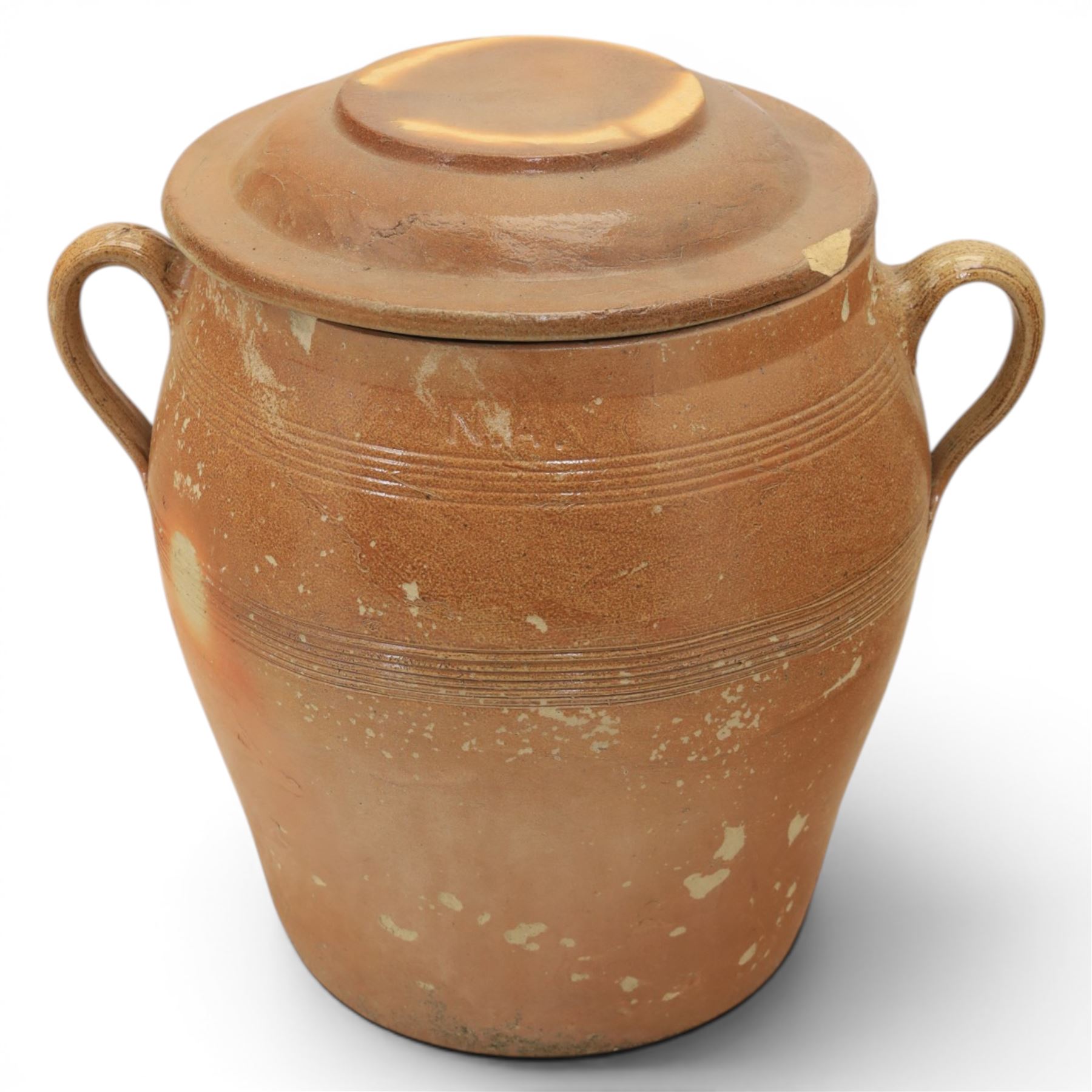 Three large 20th century Spanish stoneware confit pots and covers, each of ovoid form with twin loop handles to shoulders, and lift off covers, tallest example H43.5cm