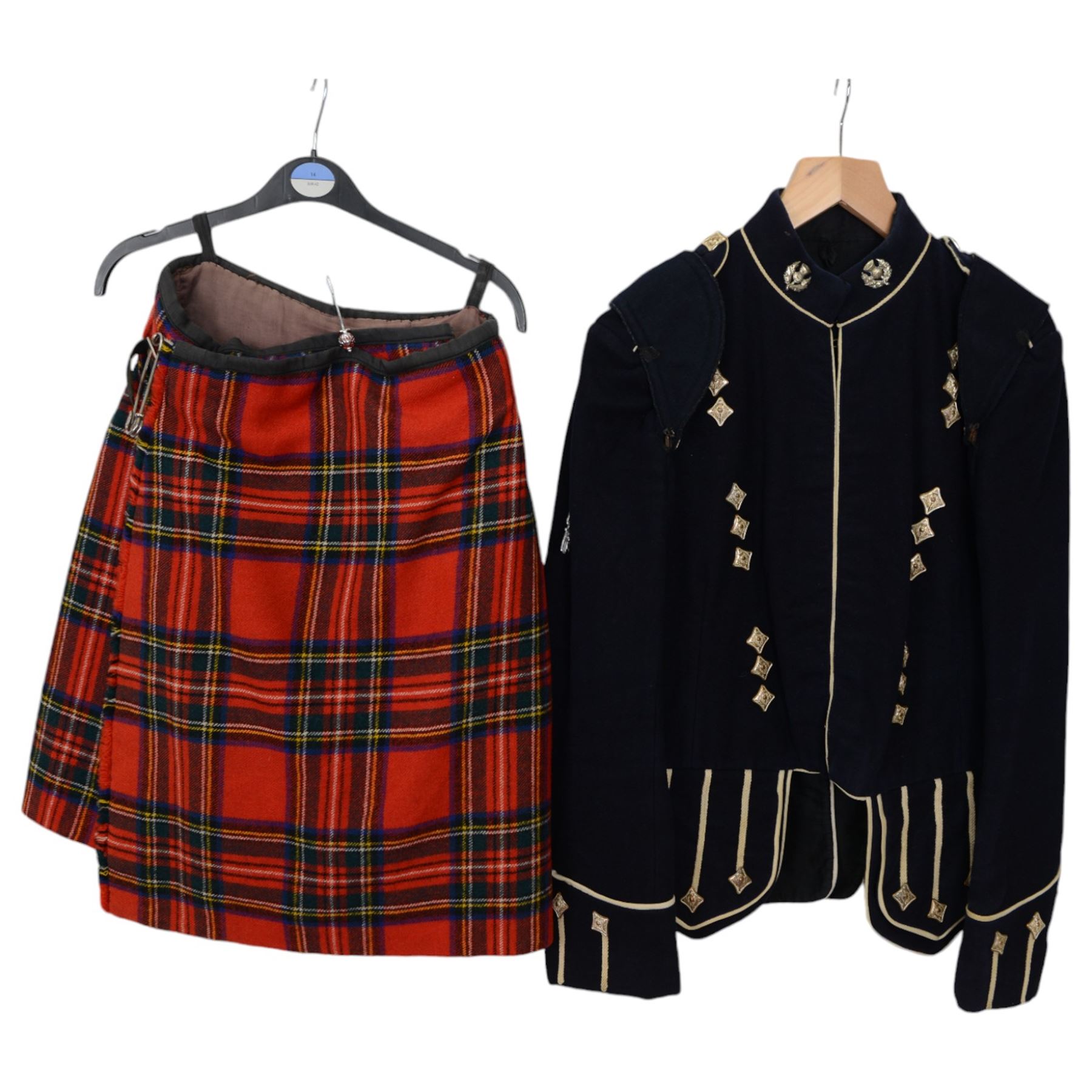 Set of mid 20th century bagpipes, with McLeod chanter, Royal Stuart cover, tassels, ribbons and spare accessories, contained within a wooden carry case, together with a Scarborough Highland Pipe Band uniform, comprising black highland dress jacket, Royal Stuart kilt, Glen Garry hat, Swinging Six sporren, Sgian Dubh knife, piper's dirk with knife and fork, etc