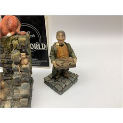 Terry Pratchett Discworld figures, designed by Clarecraft, comprising Rincewind and Luggage bookend DW41, Imp Y Celyn, DW81, C.M.O.T Dibbler, DW35, Rincewind, DW01 and Susan Sto Helit, boxed, DW77