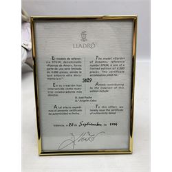 Lladro figure, Garden of Dreams, modelled as a woman reclining in front of trellis of flowers on a mahogany base, limited edition 3129/4000, sculpted by  José Puche, with original box, no 7634, year issued 1994, year retired 1996, H32cm