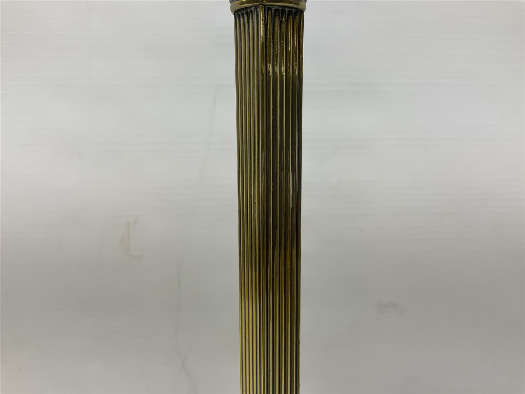 Early 20th century Daalderop of Holland Art Nouveau brass smokers stand, the square sided column stem raised upon circular spreading base with mounted ash tray decorated with typical Art Nouveau stylised motifs, with mark beneath, H72cm