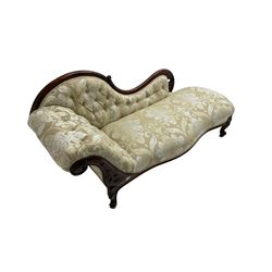 Victorian mahogany chaise longue, scrolled back with pierced and floral carved decoration, champagne foliate pattern fabric, cabriole feet with brass and ceramic castors