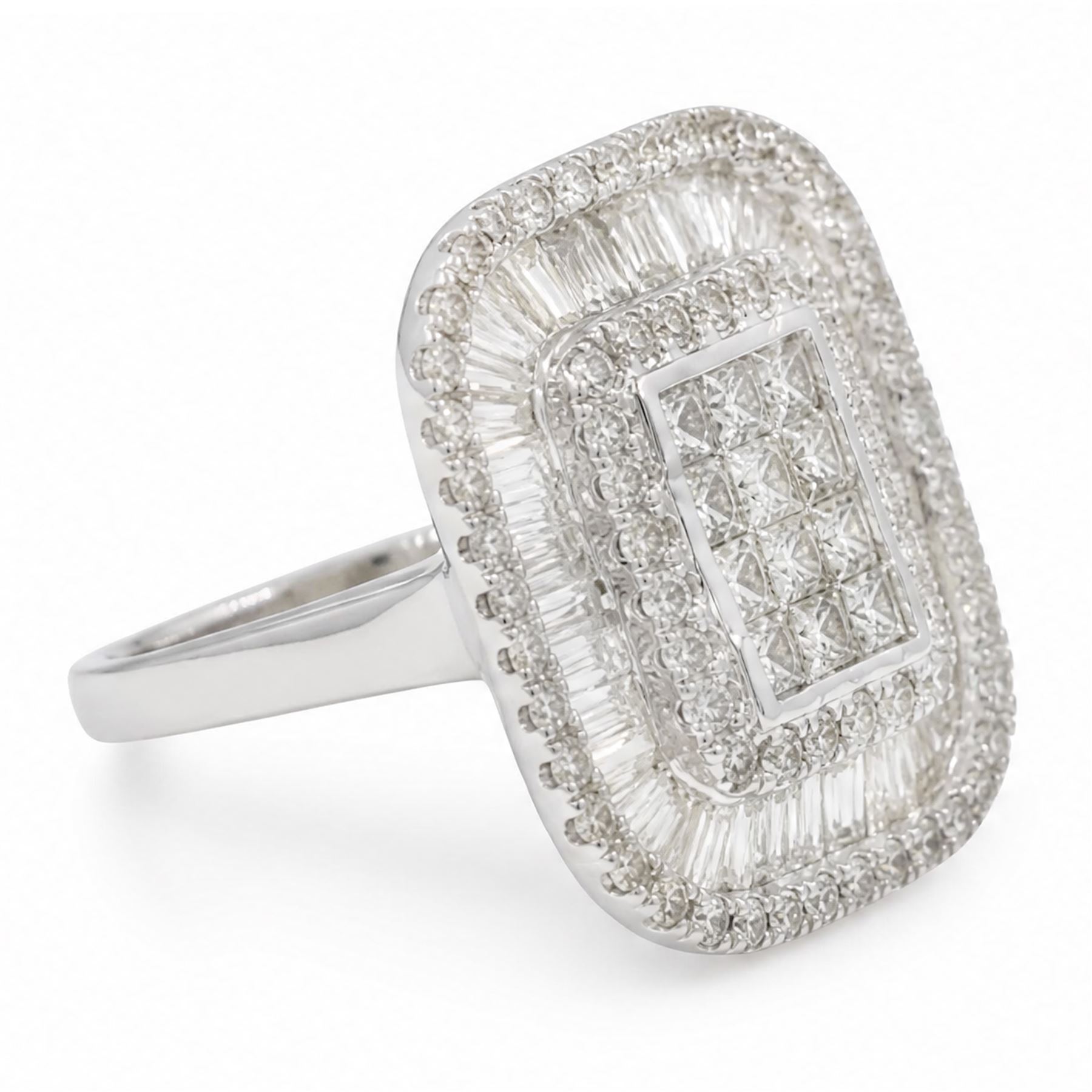 White gold diamond cluster ring, pave set with princess cut, baguette cut and round brilliant cut diamonds, hallmarked 9ct, total diamond weight 3.40 carat