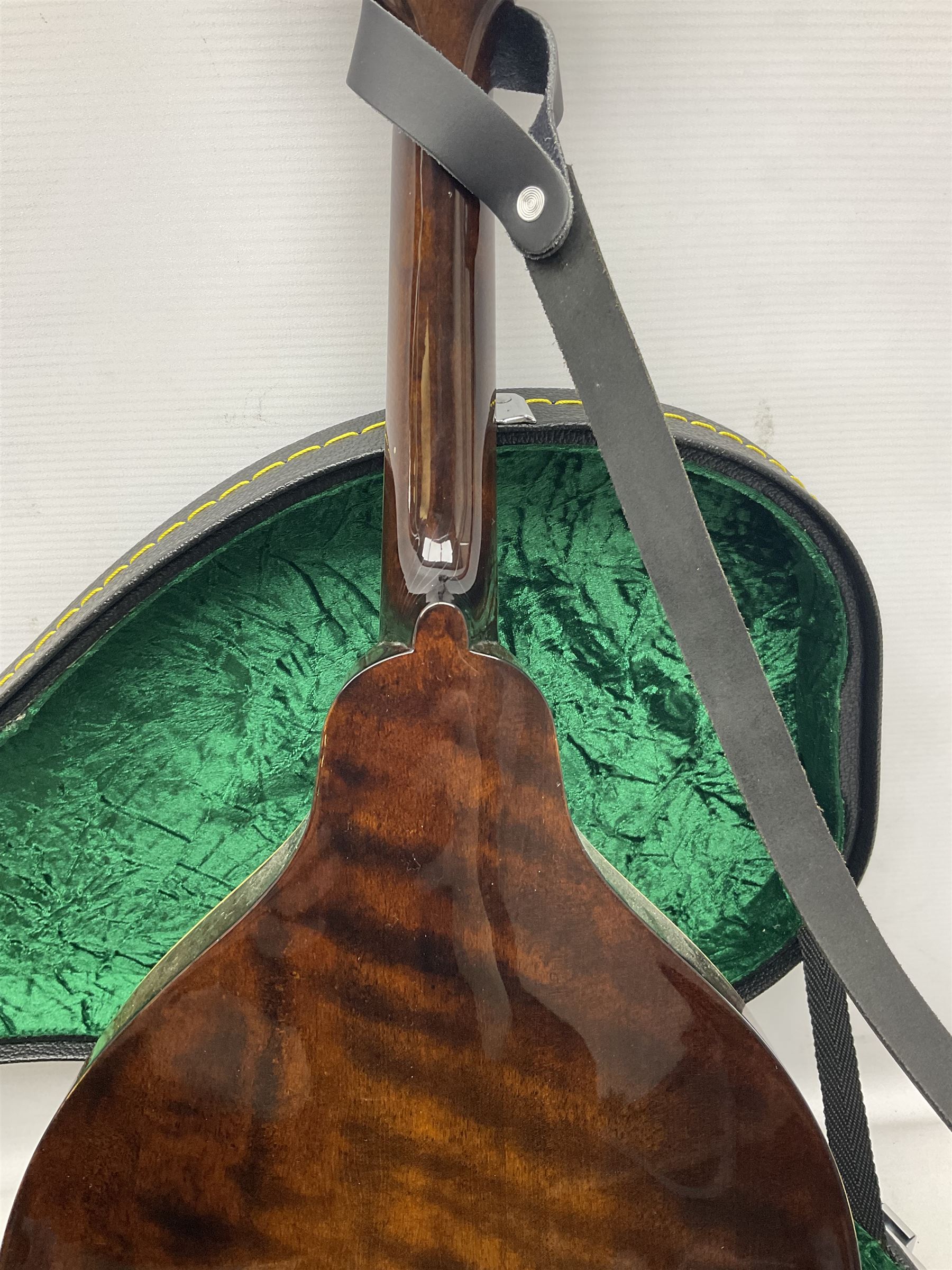 Eastman eight-string mandolin model MD504, serial no.140435406, L66cm; in TGI hard carrying case; together with case of instructional CDs