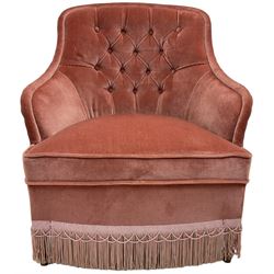 Victorian style upholstered tub-shaped bedroom chair, upholstered in buttoned pink fabric, on turned feet