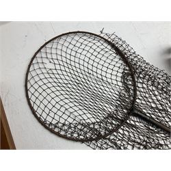 Fishing tackle and accessories housed in two wicker creels, including a landing net, fly tin, small brass reel, other reels to include two Intrepid Boy'o examples, crab lines etc 