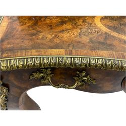 Late 19th to early 20th century French figured walnut writing desk, raised back fitted with drawers, shaped top with Kingwood banding and foliage cast edge moulding, fitted with single drawer, on cabriole supports mounted by shell and flower head cartouches 