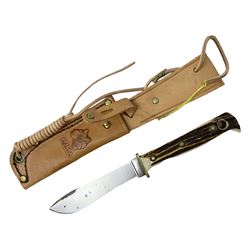 German Puma Hunter's-Pal knife, the 10cm steel blade marked model 6397, serial No.72573 to guard, fixed blade, antler scales; in original hard plastic case with paperwork and guarantee label; with brown leather sheath marked Puma L22.5cm overall