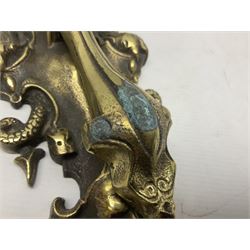 Gothic style cast brass door knocker, modelled with the Greek three-headed hell hound Cerberus on Rococo style base with central knocker of tear drop above Hades, God of the underworld, L29cm