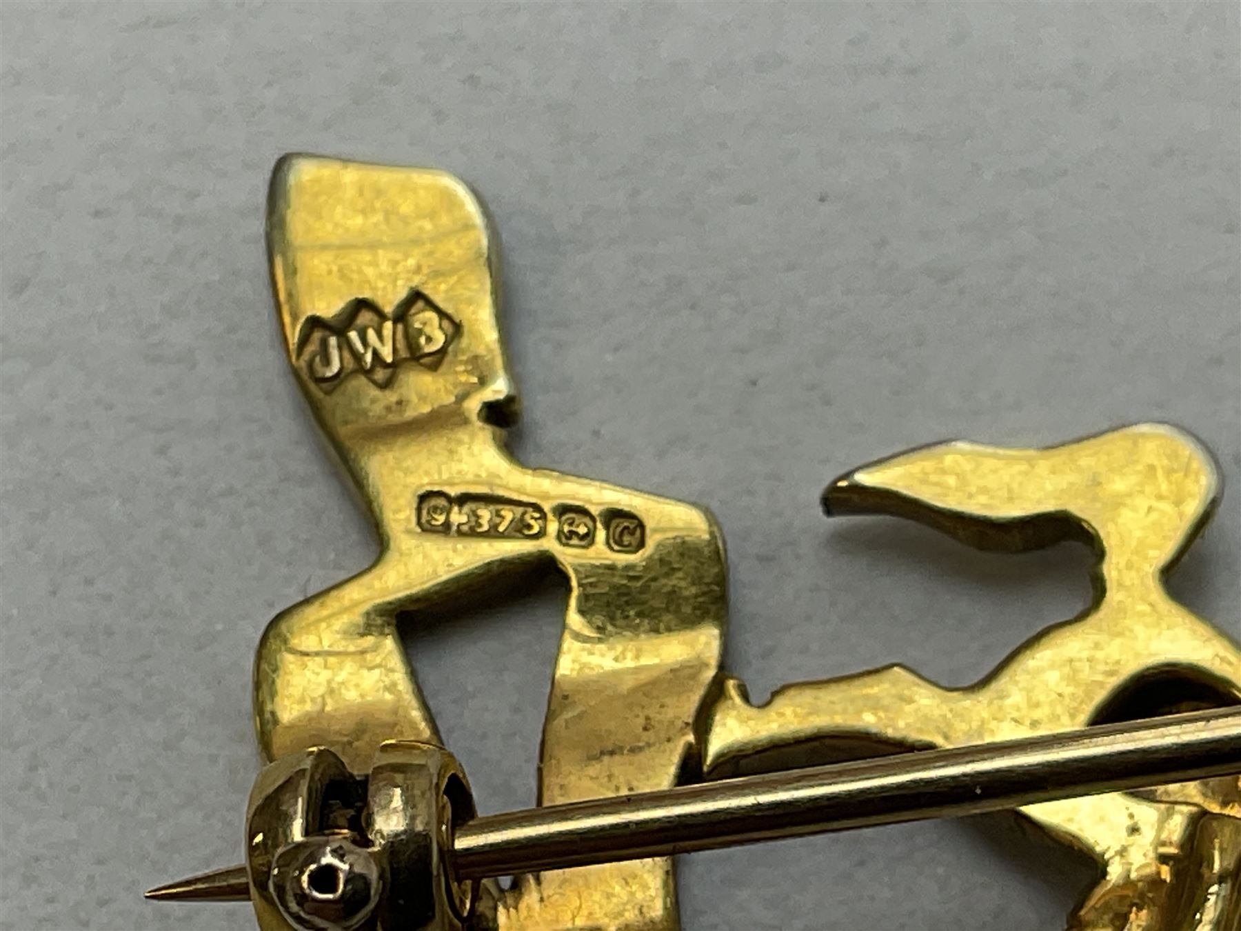 Royal West Kent regiment 9ct gold and enamel sweetheart brooch; The Queens Own regiment silver and enamel sweetheart brooch; and another sweetheart brooch for the Royal West Kent regiment (3)