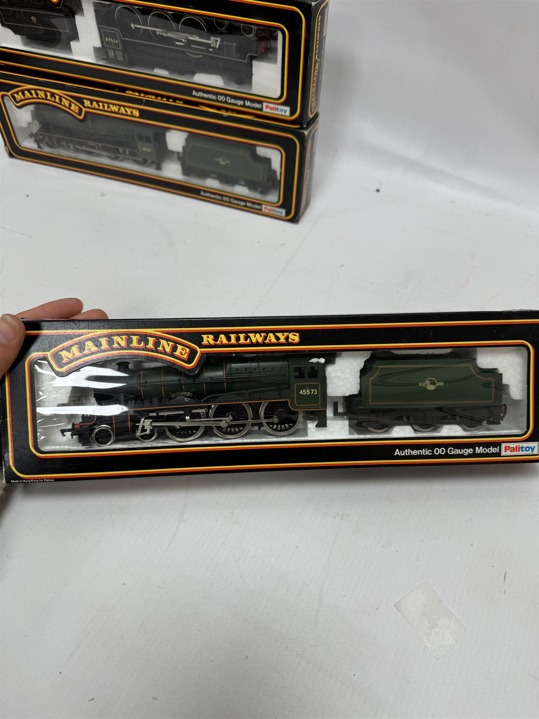 Seven Mainline Railways '00' gauge Jubilee Class 4-6-0 locomotives, comprising five 37062 in BR green livery, reworked as United Province no. 45578, Newfoundland no. 45573, Bellerophon no.45694, Nelson no. 45664 and no. 45691, 37047 Mars locomotive no. 45698 with Fowler tender in BR green livery and 936153 Western Australia locomotive no. 45568 in BR black livery, all boxed
