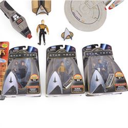 Four carded Playmates Star Trek figures, comprising Ensign Harry Kim, Galaxy Collection Kirk, Original Spock and Spock, together with a small collection of loose Star Trek models and star ships