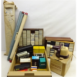  Collection of 1960s and later 35mm slides including Hong Kong, Kuala Lumpur, Austria and others in two wooden boxes, cased Halina video recorder, cased Kodak 'Brownie' camera and other various camera equipment, a View-Master Junior projector and Raybrite cine projection screen in one box  