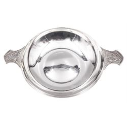 Large modern silver Quaich, of circular form with twin handles cast with stylised dragon motifs, hallmarked Birmingham 2009, makers mark W&W, D18cm, approximate weight 11.14 ozt (346.8 grams)