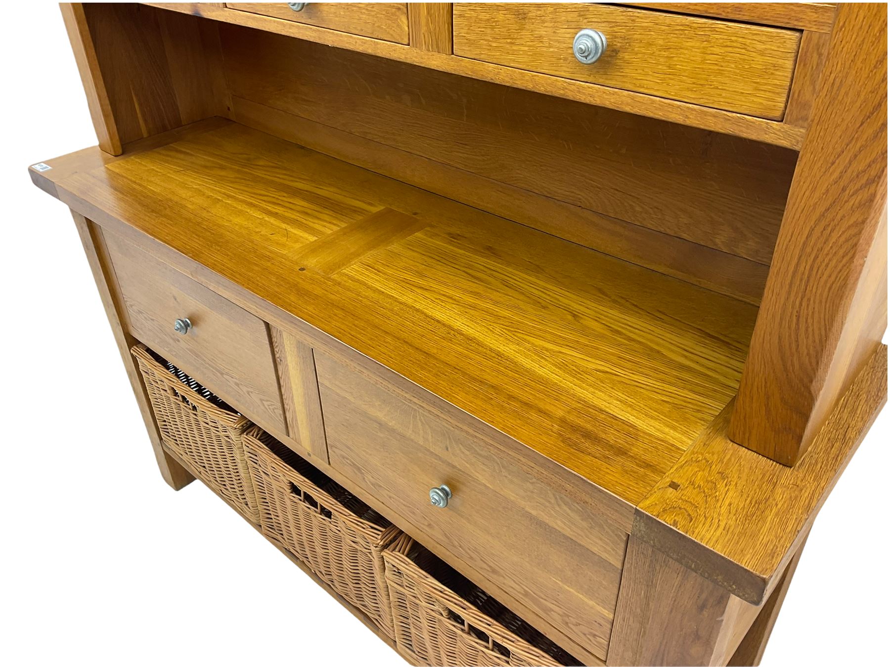 Manor Oak - light oak dresser and rack, fitted with two shelves with three drawers, two deep drawers and pot baked base with basket storage