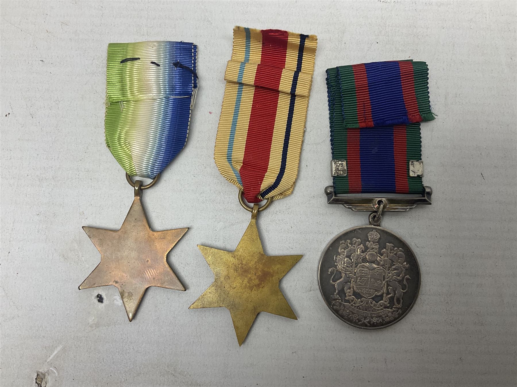 WW2 Canada Volunteer Service Medal 1939-45 with maple leaf clasp; and five WW2 Stars - Burma Star, Atlantic Star, Africa Star with 8th Army clasp, France and Germany Star and Pacific Star with Burma clasp; all with ribbons (6)