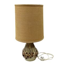 Large brown and cream glazed pottery table lamp with pierced decoration, with a hessian lampshade, H68cm   