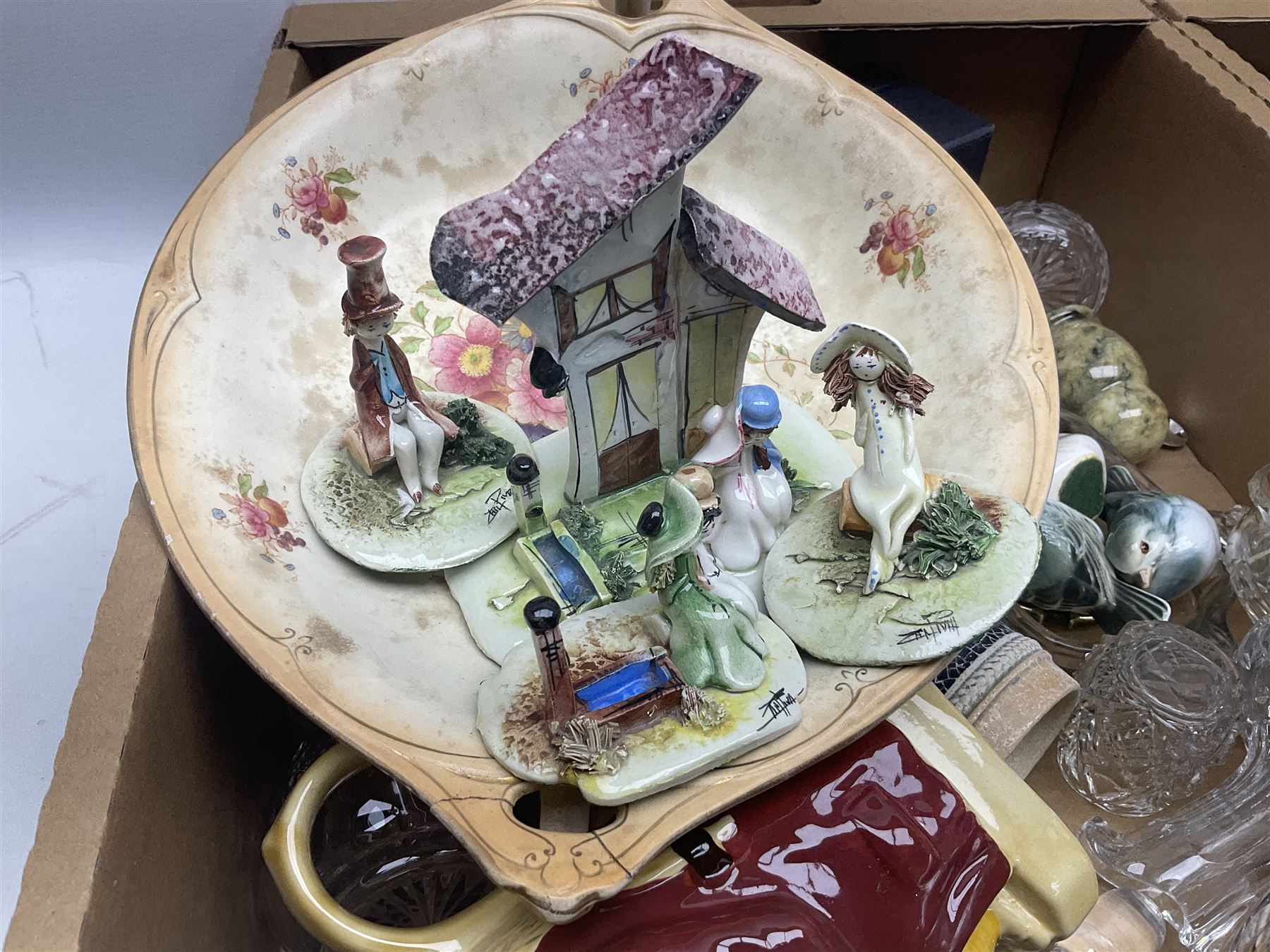 Caithness glass paperweight, together with other glassware, Zampiva figures and other collectables, in three boxes 