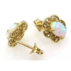  Pair of 9ct gold, filigree set opal stud ear-rings  