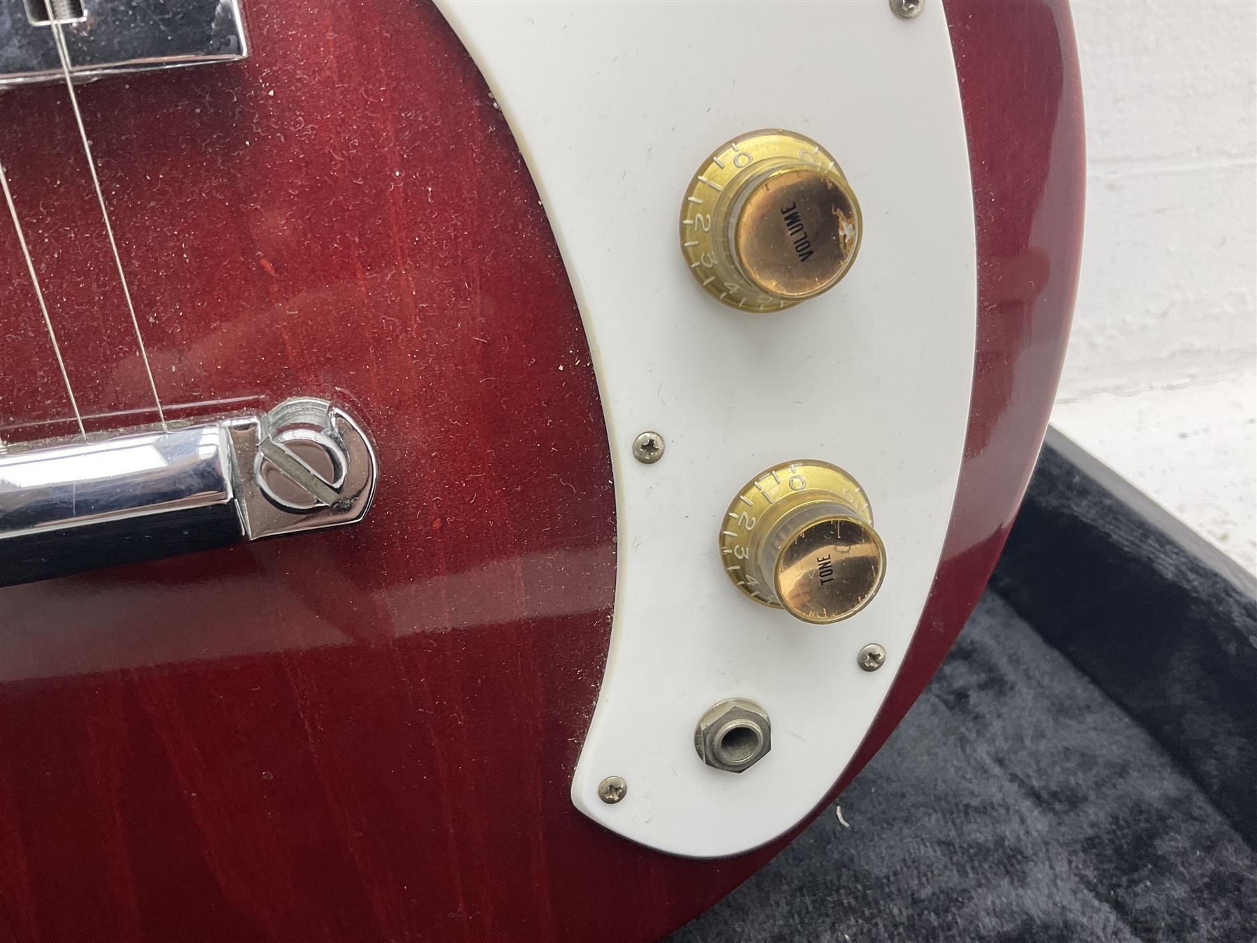 Gibson Marauder style six-string electric guitar with cherry coloured body, marked made in Japan L101cm; in locking hard carry case