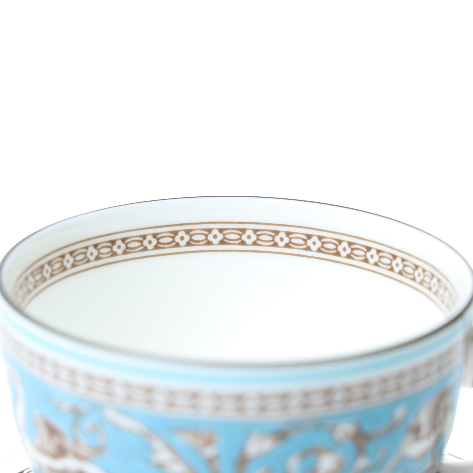 Extensive Wedgwood Turquoise Florentine part service tea, dinner and coffee service for six covers comprising six dinner plates, six dessert plates, six soup bowls and stands, pair of vegetable dishes and covers, gravy boat ad stand, oval meat plates, six tea cups and saucers, six coffee cans and saucers, six tea plates, teapot, coffee pot, sucrier and cover, sugar bowl, milk and cream jugs and cake plate, 72 pieces
