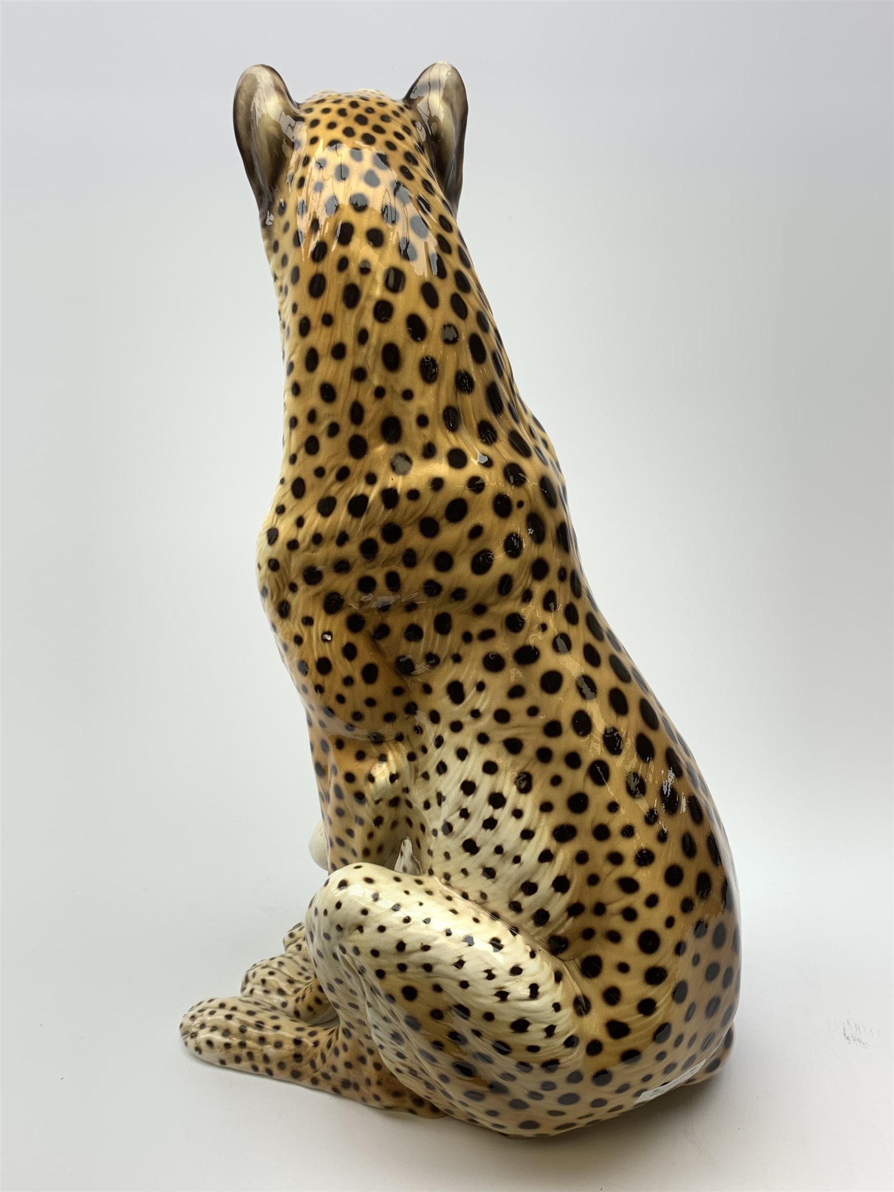 A large Italian pottery fireside model of a Cheetah, H66cm.