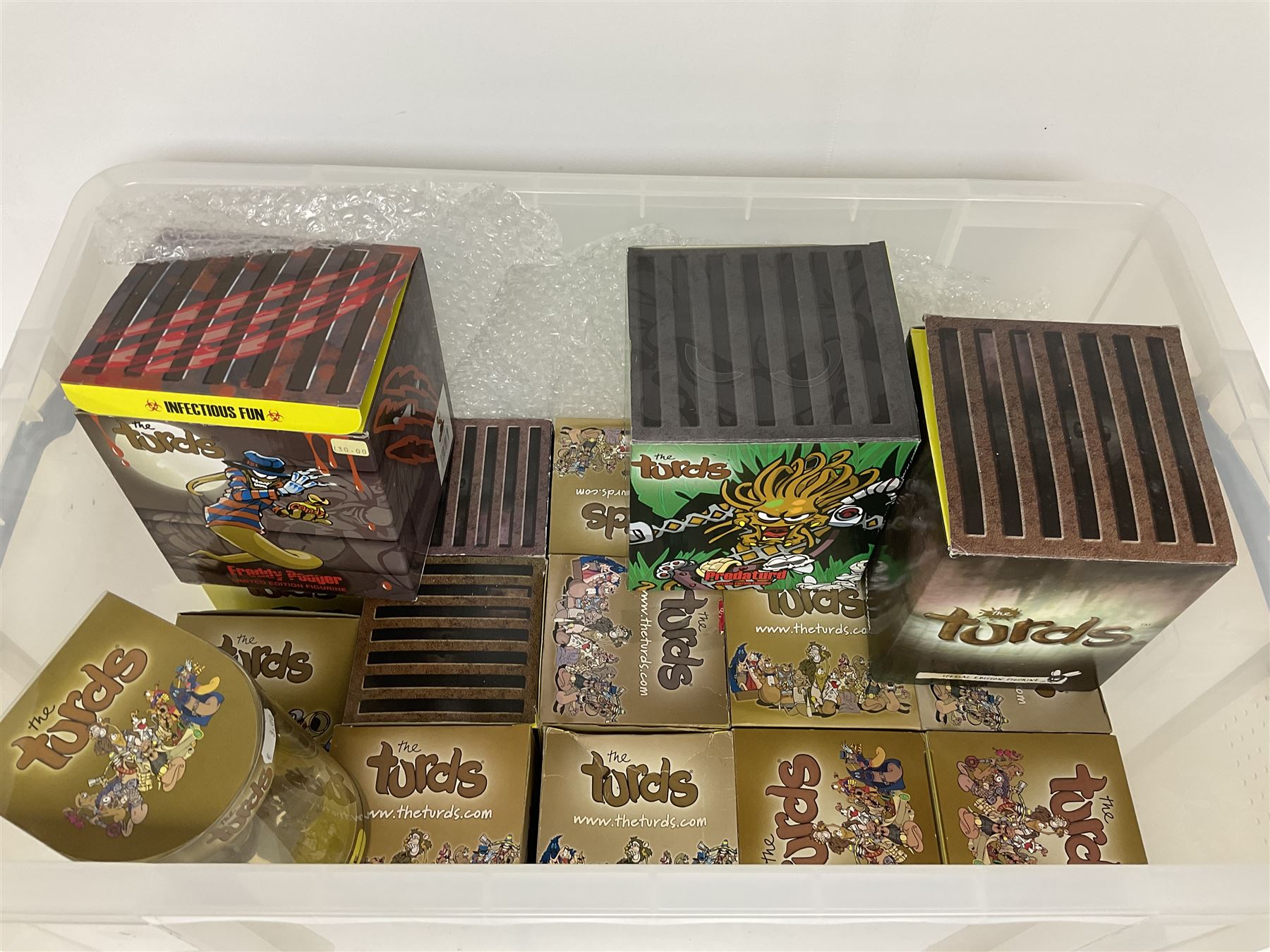 Eighteen The Turds figures, all in boxes