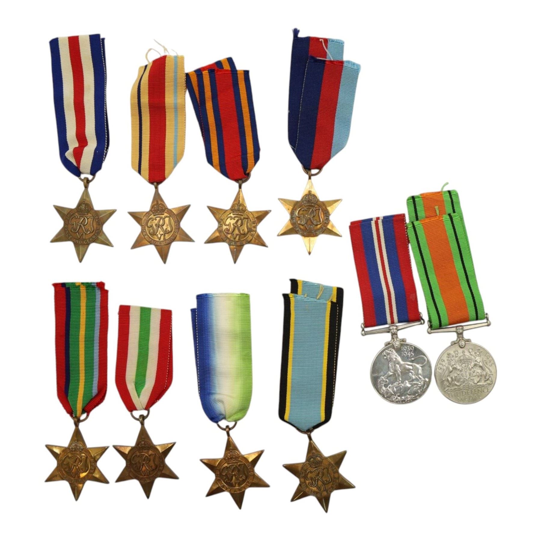 WWII British medals, comprising War medal, Defence medal, 1939-1945 Star, Burma Star, Atlantic Star, France and Germany Star, Italy Star, Pacific Star
