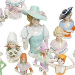 Collection of early 20th century ceramic half dolls, approximately 25