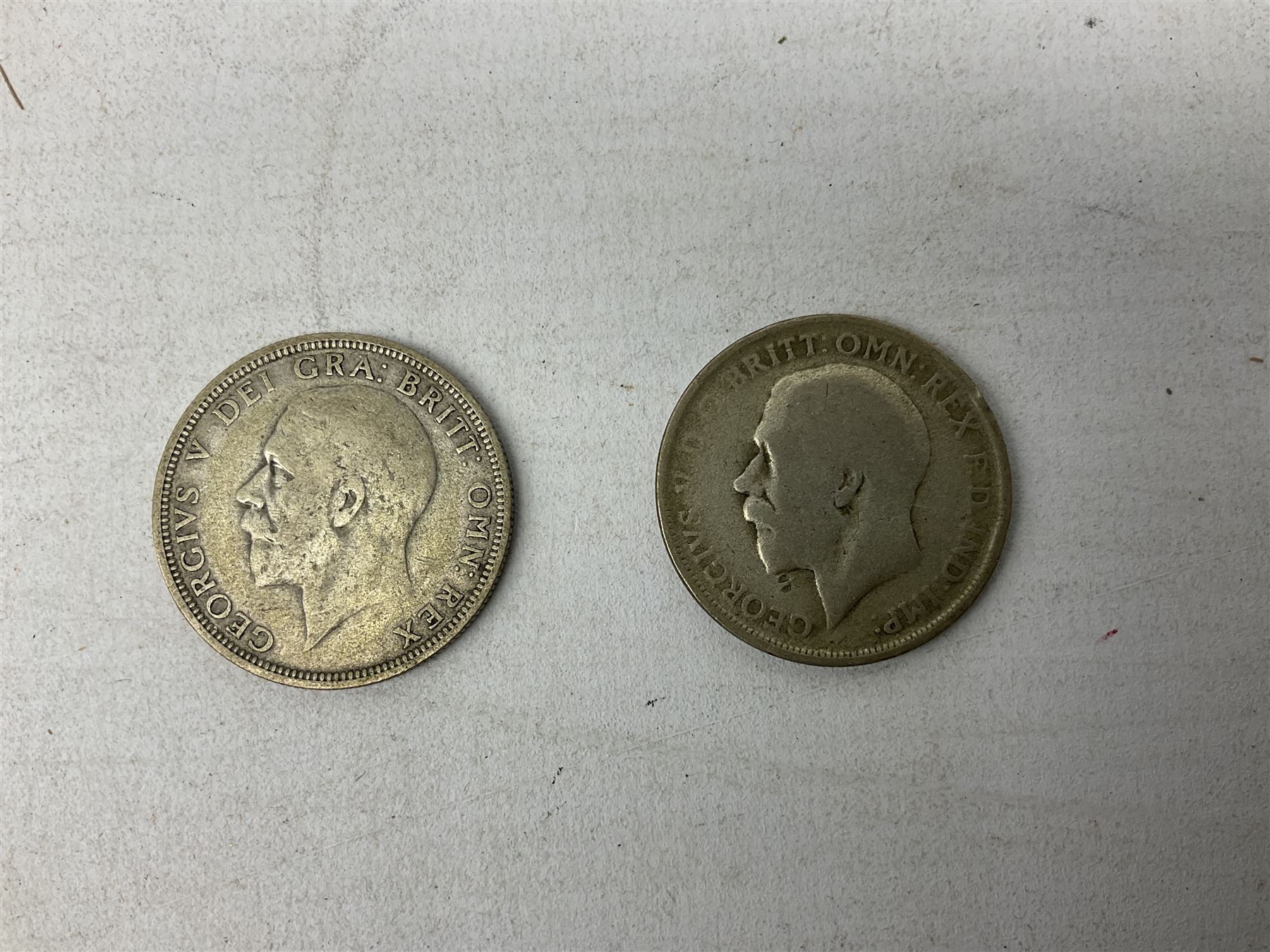 Coins and banknotes, including Lowther mis-printed five pound note 'HH09', Somerset one pound note 'CZ13', United States of America 1971 and 1976 one dollar coins, Great British commemorative crowns, Queen Elizabeth II 1997 two pound coin, 2008 five pound coin, King George V 1920 and 1931  florins and various other pre-decimal coins