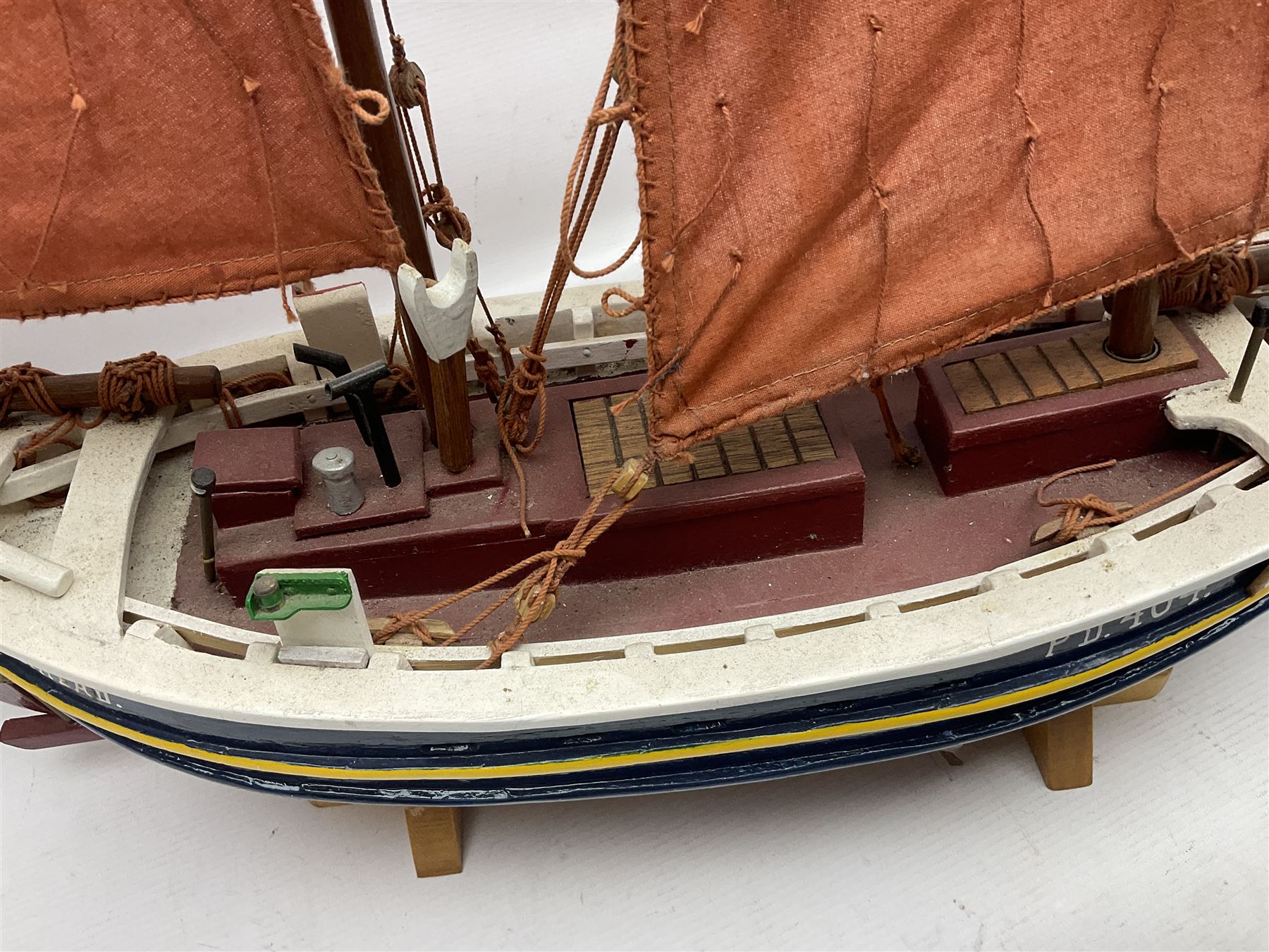 Wooden model of the Peterhead Herring Fishing Boat, Love Divine, PD404. on stand together with Wick Herring Fishing Boat, Galilee WK.1. on stand, L105cm, H64cm