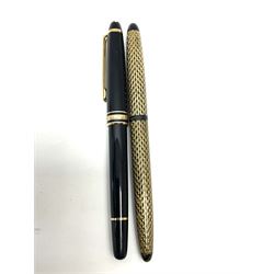 Montblanc Meisterstuck black fountain pen numbered MK1365397, the cap with gilt clip and triple cap band, bi-colour nib engraved with '4810 14k Montblanc 585' and cartridge filling system; together with a Sheaffer's Australia Lady Skripsert IV fountain pen (2)