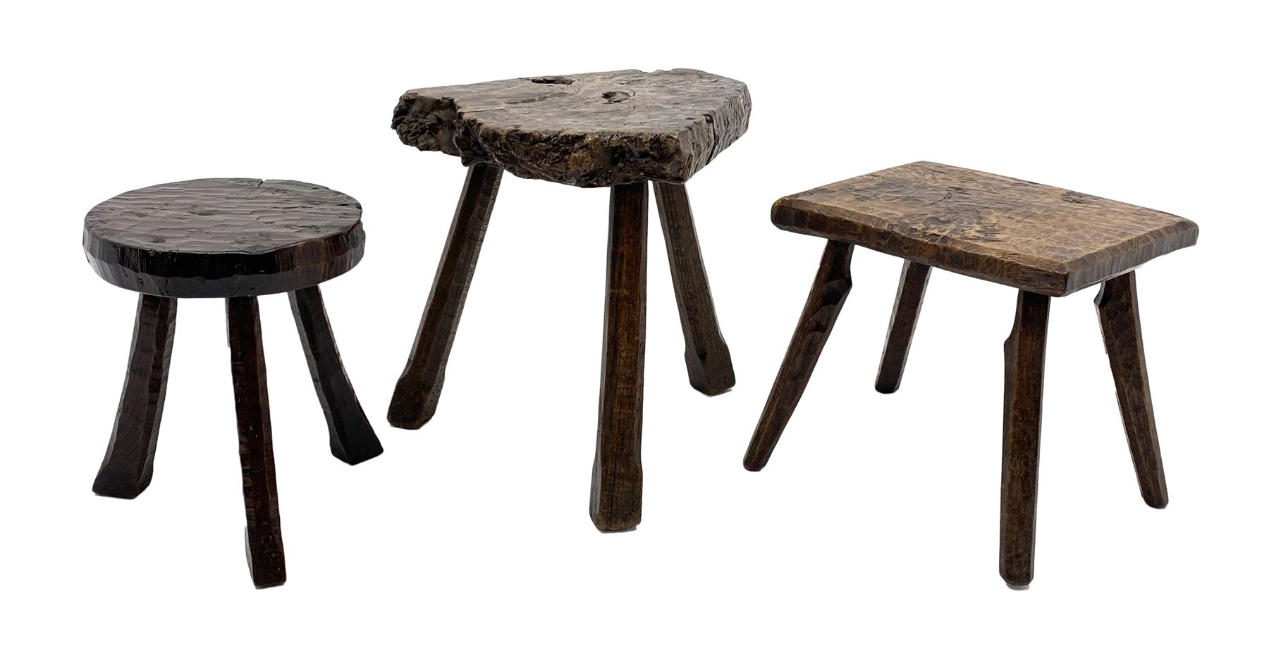 Collection of three mid 20th century stools by Jack Grimble of Cromer - rectangular tooled oak seat on four splayed supports (38cm x 31cm, H35cm), circular tooled burr oak seat on three supports (D29cm, H35cm), shaped burr top on three supports (L44cm, H45cm), each signed underneath