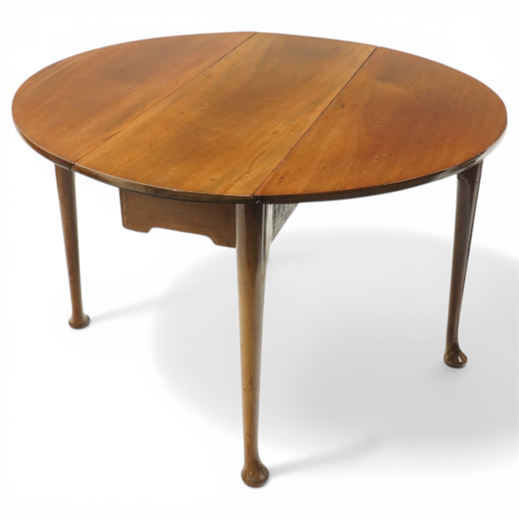 Mid 18th century mahogany pad foot drop leaf table, the circular top with gate leg action, freshly polished throughout