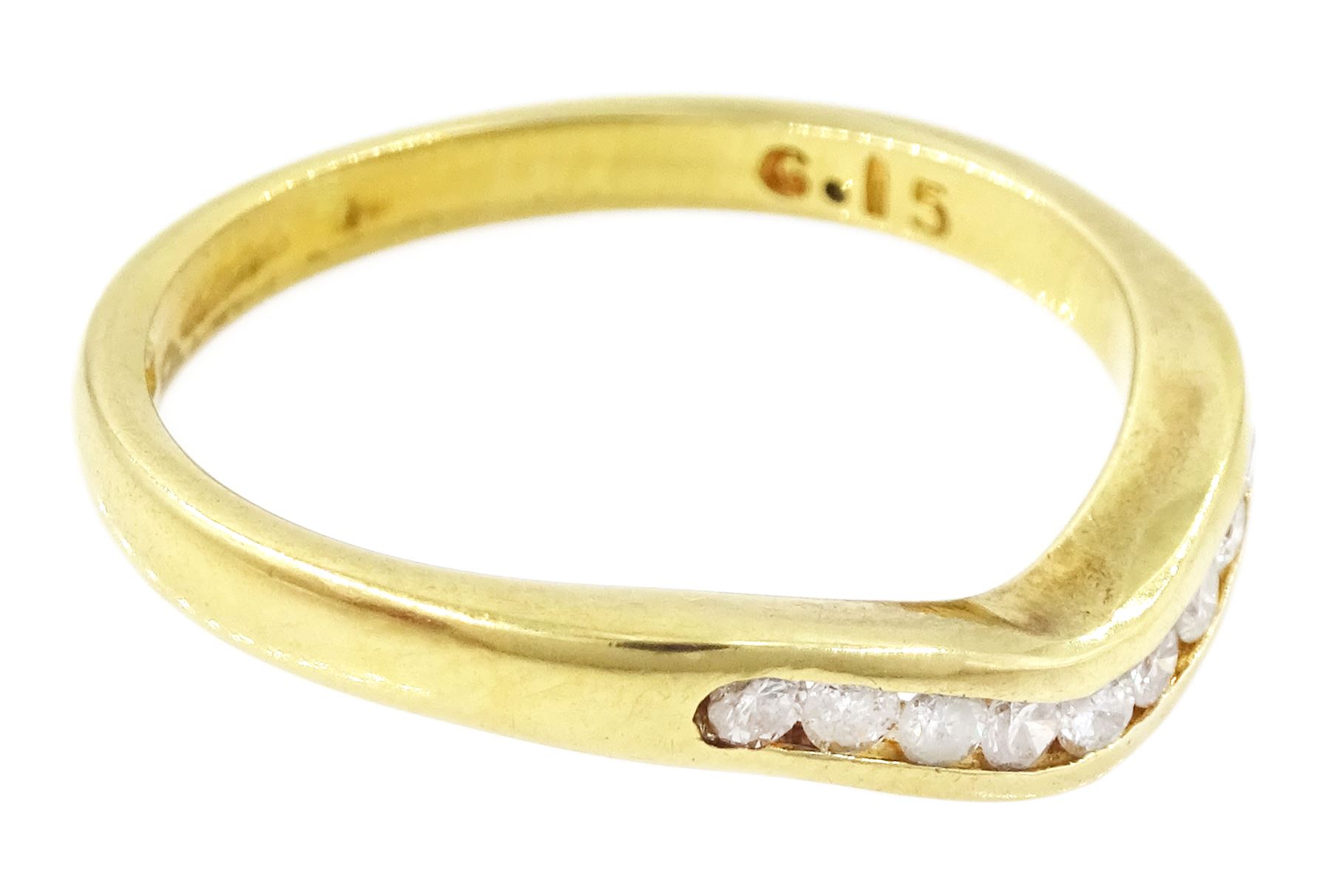 18ct gold diamond wishbone ring, channel set with nine round brilliant cut diamonds, Birmingham 1994, total diamond weight 0.15 carat