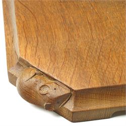 Mouseman - oak chopping board, of canted octagonal form with concave handles, with carved mouse signature, by the workshop of Robert Thompson of Kilburn