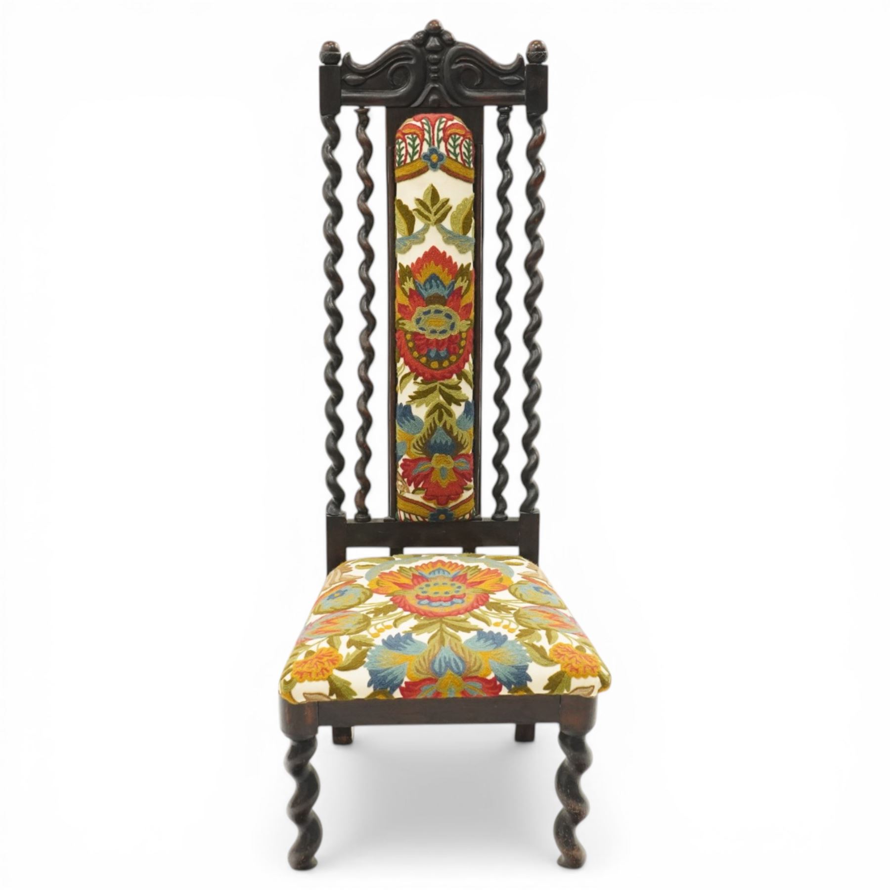 19th century Carolean design oak hall chair, carved cresting rail over barley-twist uprights, high back and loose seat upholstered in wool-work foliate tapestry (W46cm H116cm); 19th century elbow chair mahogany with spiral turned centre rail and roundel-applied frieze (W56cm H85cm)