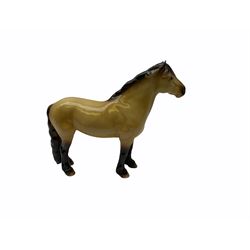 Beswick horse figures, comprising Highland Pony 1644, and another, probably Aran Bahram in grey, each with printed mark beneath.
