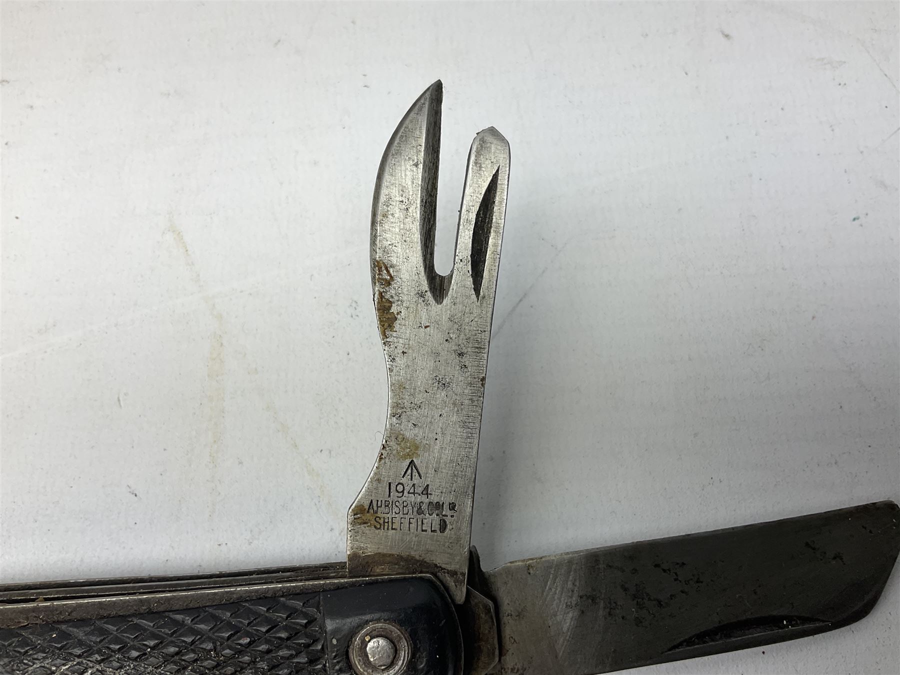 WW2 British army folding jack/clasp knife, the blade marked A.H. Bisby & Co Ltd Sheffield with broad arrow and date 1944, marlin spike and can opener; and British Navy seaman's rope pocket knife, the blade marked Venture H.M. Slater Sheffield (2)