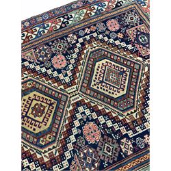 Persian navy blue ground geometric pattern rug