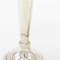 Two pairs of early 20th century silver vases, comprising pair of Edwardian trumpet vases with fluted rims upon a circular domed foot, hallmarked S Blanckensee & Son Ltd, Chester 1907, and a smaller 1920s pair, hallmarked Chester 1920, maker's mark worn and indistinct, tallest H19cm