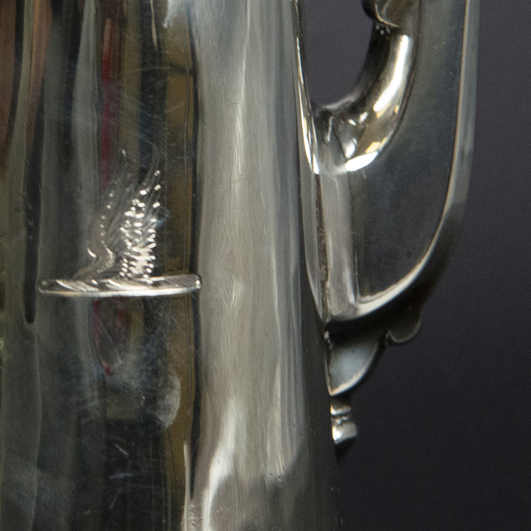 George II provincial silver coffee pot, of tapering cylindrical form, with wooden scroll capped handle, hinged cover with bell finial, and engraved crest to body, hallmarked John Webber of Plymouth, Exeter 1759, H21cm