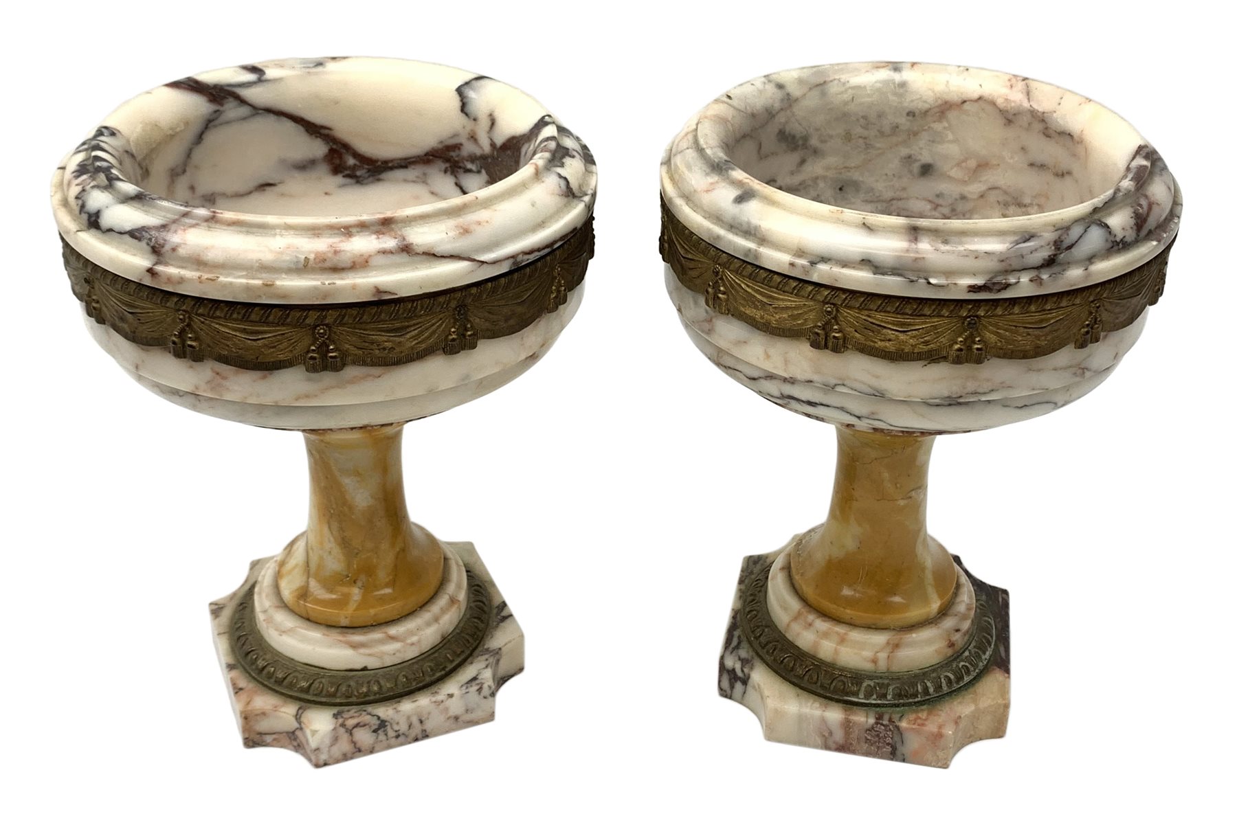 Pair of Neo Classical veined white marble urns, decorated with a metal band of classical drapes, raised upon a pedestal foot, H23cm