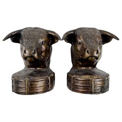 Brass bookends modelled as bulls, together with brass hose and three others 