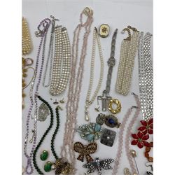 Large collection of costume jewellery including amber beads, rose quartz necklace, brooches, bracelets and necklaces