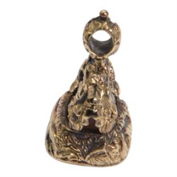 Late 18th/early 19th century 12ct gold fob seal, the carnelian matrix engraved with the Chichester family coat of arms, depicting a chequy shield beneath a crest of a heron with an eel in its beak, within a scrolling foliate mount, the sides detailed with a hound in chase and birds, H3cm

Provenance: By family descent from the Chichesters of Arlington Court, Devon; from the collection of Andrew Chichester Everitt.
