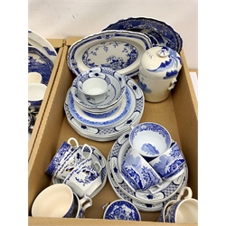 A large quantity of various blue and white ceramics, to include Spode Italian, eight bowls, one larger bowl, three tea cups, two saucers, one larger saucer, one side plate, four twin handled soup bowls, sauce boat and stand, and milk jug, plus Adams & Sons, Booths, Woods, etc. (Qty). 
